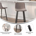 Pair of Armless Upholstered Metal Counter Stools