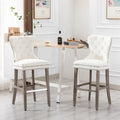 Carter Set of 2 Tufted Wingback Bar Stools with Nailhead Trim and Antique Grey Legs