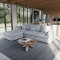 Sectional Couch with L-Shaped Design and Linen Upholstery, Featuring Multiple Cushions