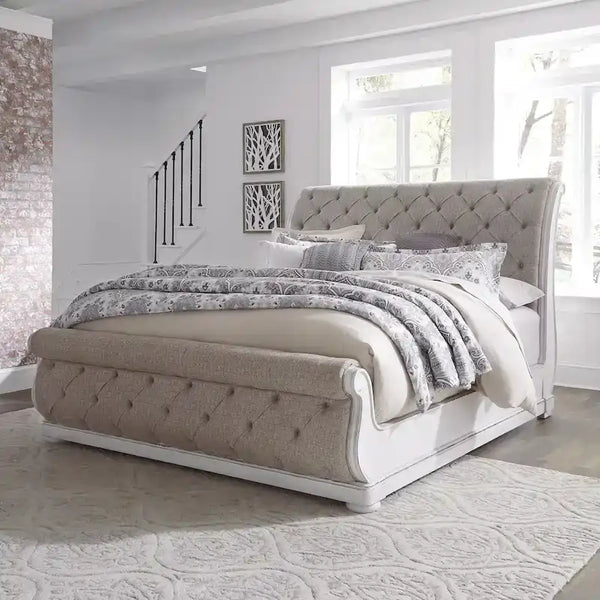Antique White King Sleigh Bed with Upholstered Design from Magnolia Manor