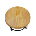 Contemporary Round Wooden Coffee Table with Intricate Carving and Metal Legs