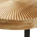 Contemporary Round Wooden Coffee Table with Intricate Carving and Metal Legs